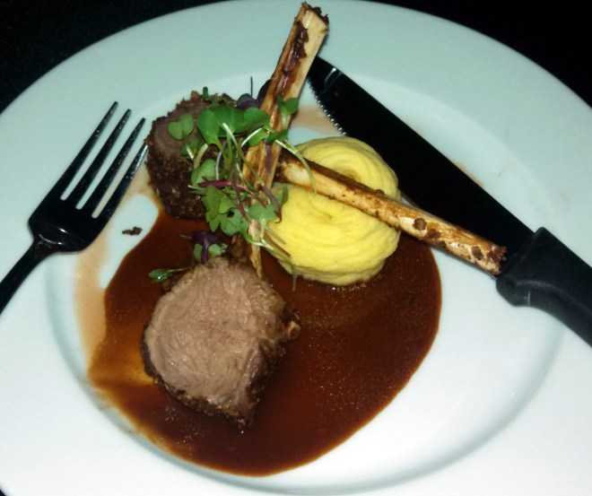 sixth course - Lamb crusted with pepitas, with black current veal jus and potato croquette. Paired with 2009 Onyx